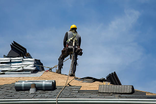 Professional Roofing technician working in Houghton, IA